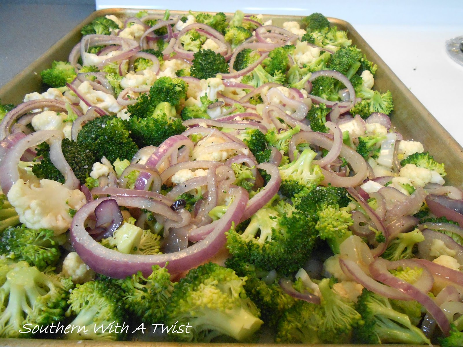 Southern With A Twist Roasted Broccoli, Cauliflower and Red Onion
