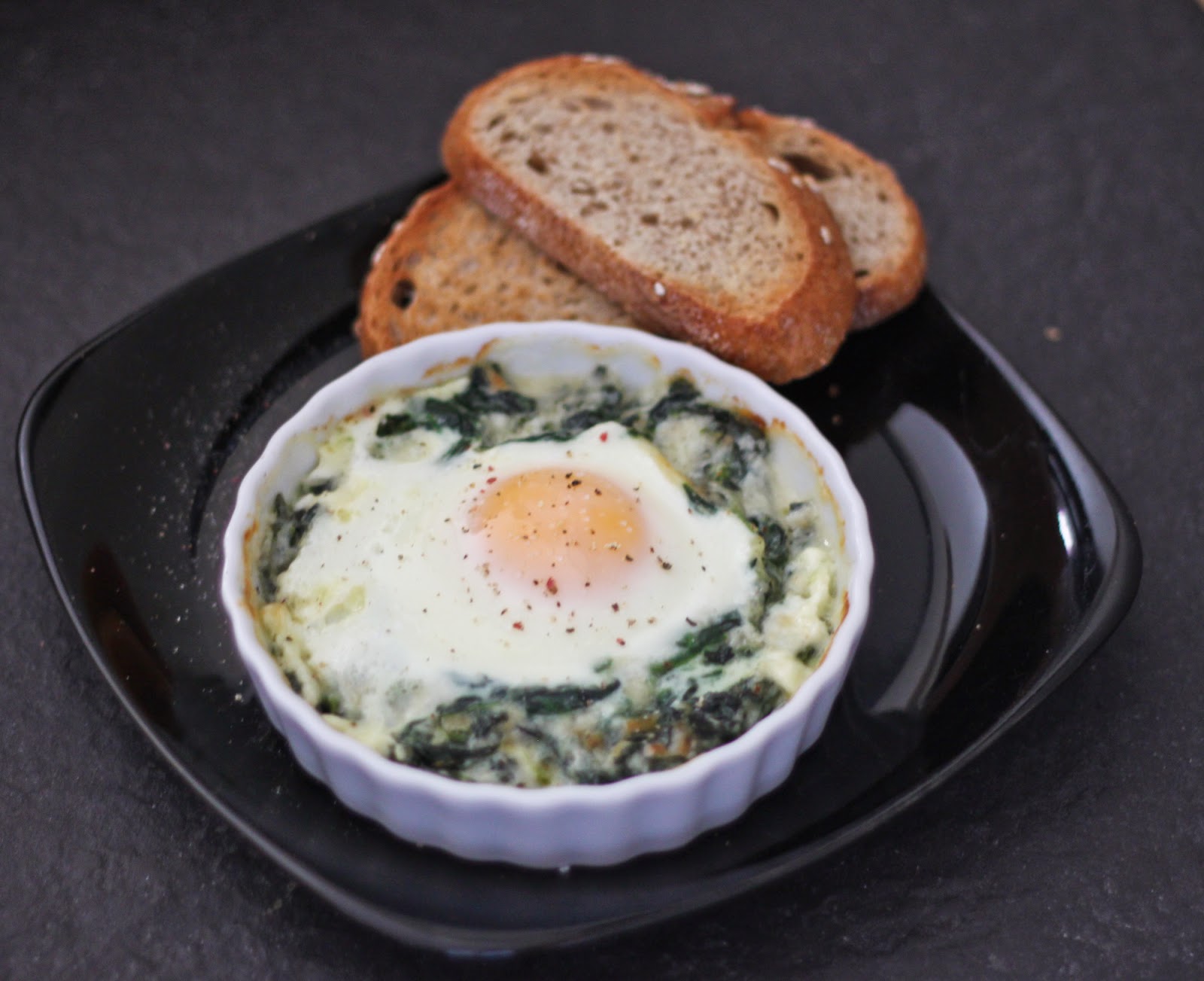 Baked eggs in creamy spinach