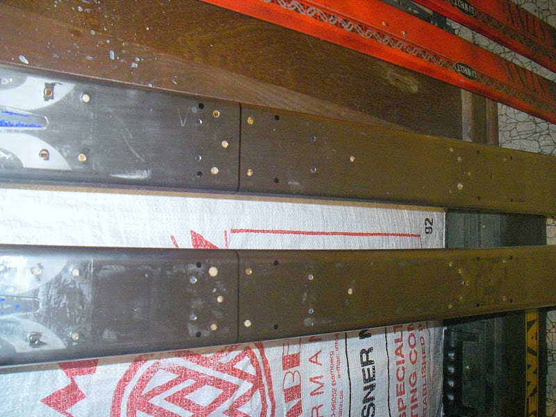 Bill in Tahoe Filling Old Binding Holes on Skis