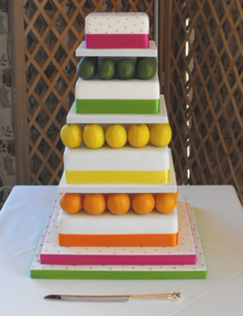 square wedding cakes with ribbon