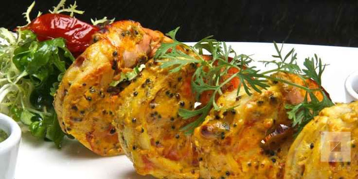 CHAR GRILLED TANDOORI SAFFRON JUMBO SHRIMPS WIT ACCOMPANIMENT  AND  GARNISH