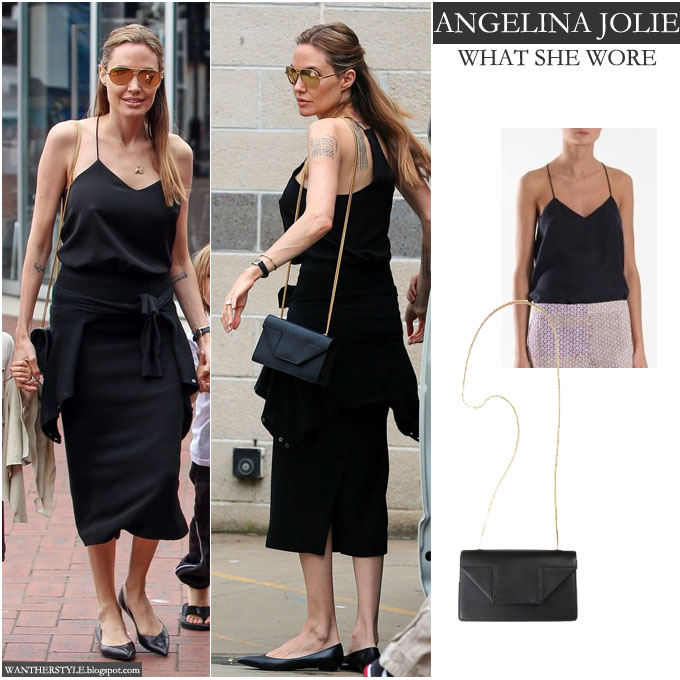 WHAT SHE WORE: Angelina Jolie in black dress with black leather shoulder  bag with gold chain strap in Sydney on September 27