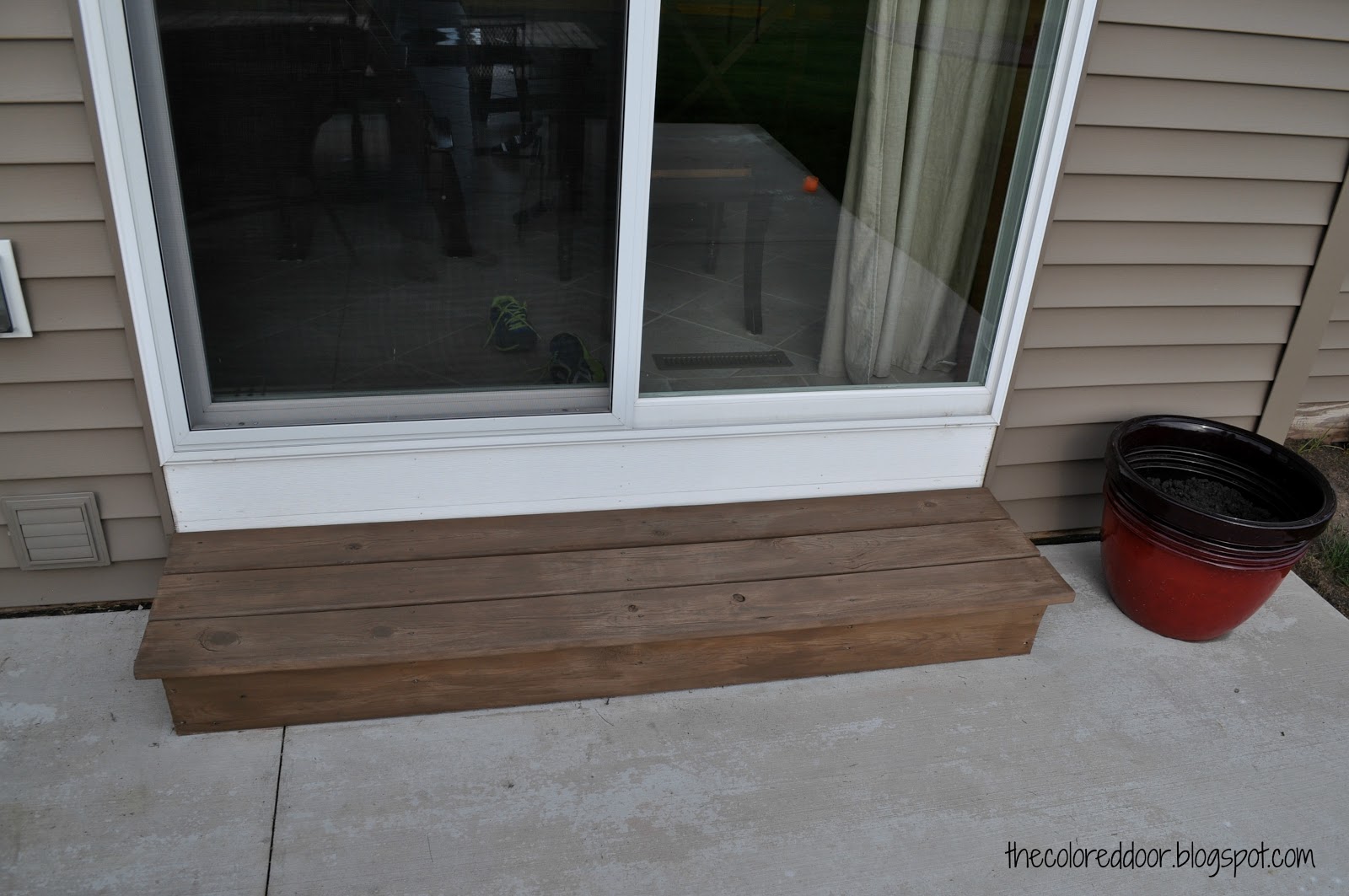 the colored door Little patio updates