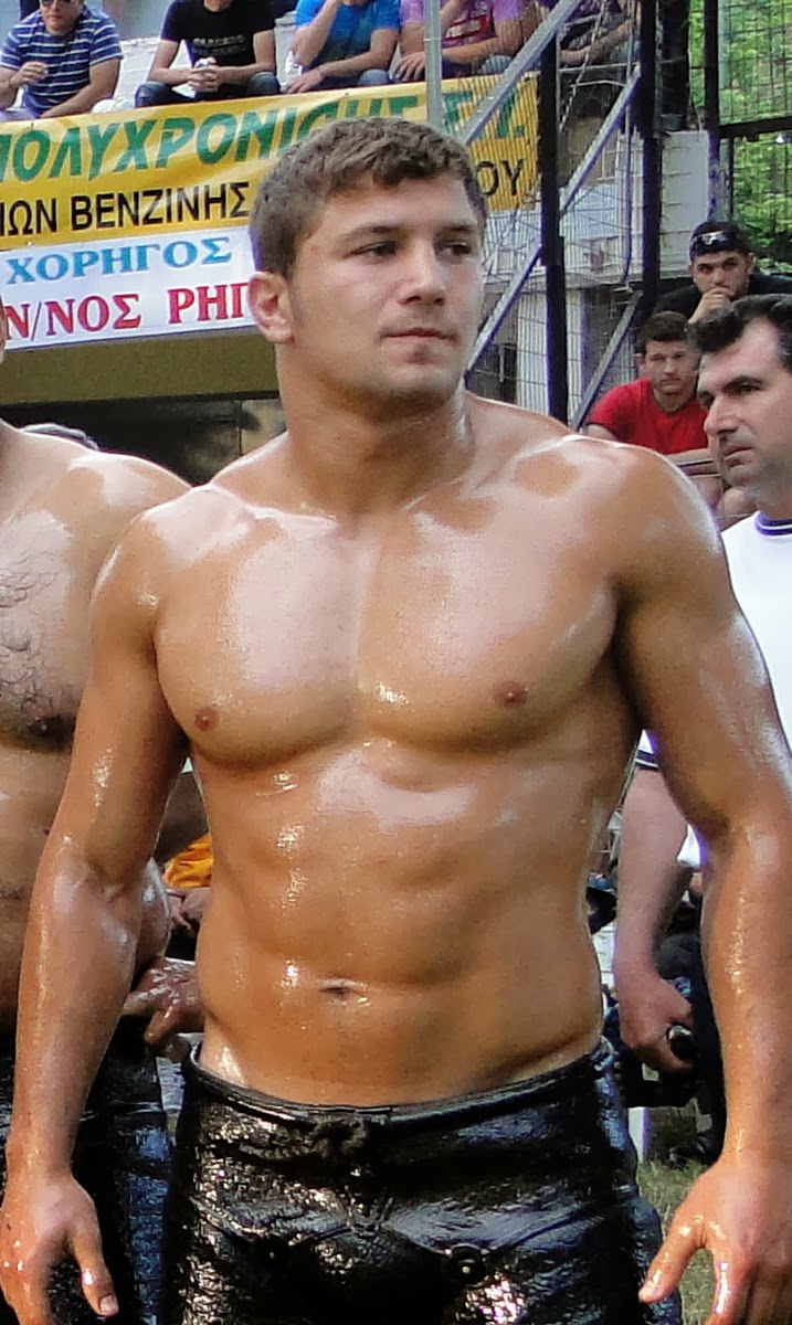 muscular gay men wrestling nude