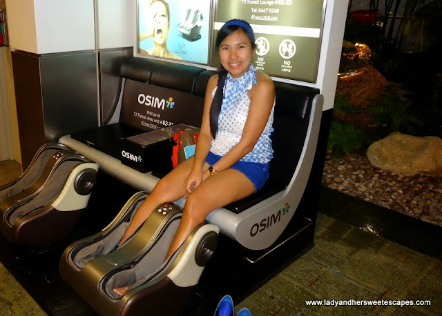 Lady having a foot massage in Changi Airport Singapore