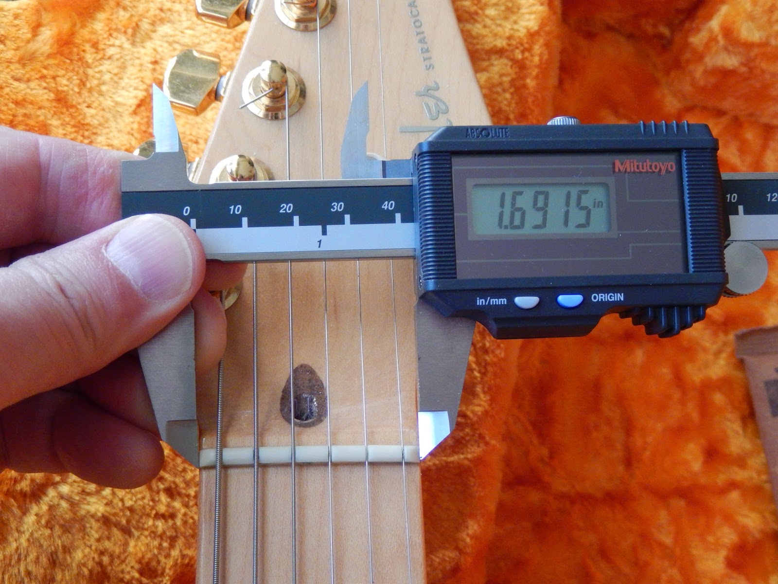 Guitar Snob Guitar Nuts measurement confusion?