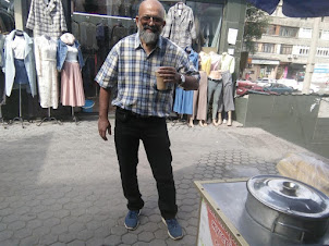 Having a "Kazakh Coffee" at the Green Bazaar or Zelionyj Bazar in Almaty,