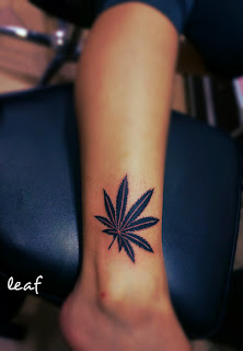 weed leaf tattoo design on the ankle