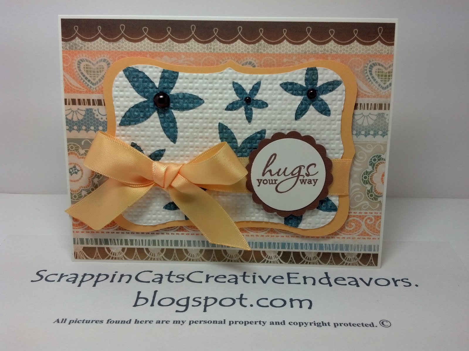 to Scrappin' Cat's Creative Endeavors Embedded embossing top