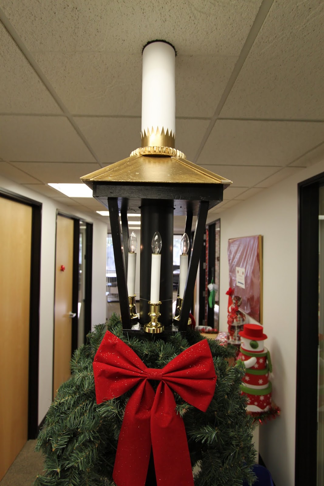 the office holiday pole decorating contest midcentury modern remodel
