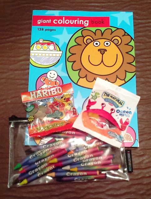 Coloring book and crayons present