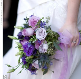 A lush purple wedding bouquet.