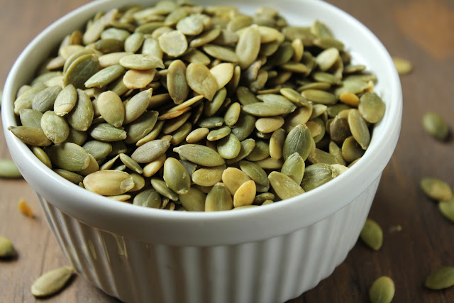 raw pepitas or hulled pumpkin seeds