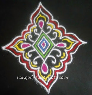 a very simple rangoli design with rhombus at centre surrounded by borders simple-rangoli-design-1211d.jpg