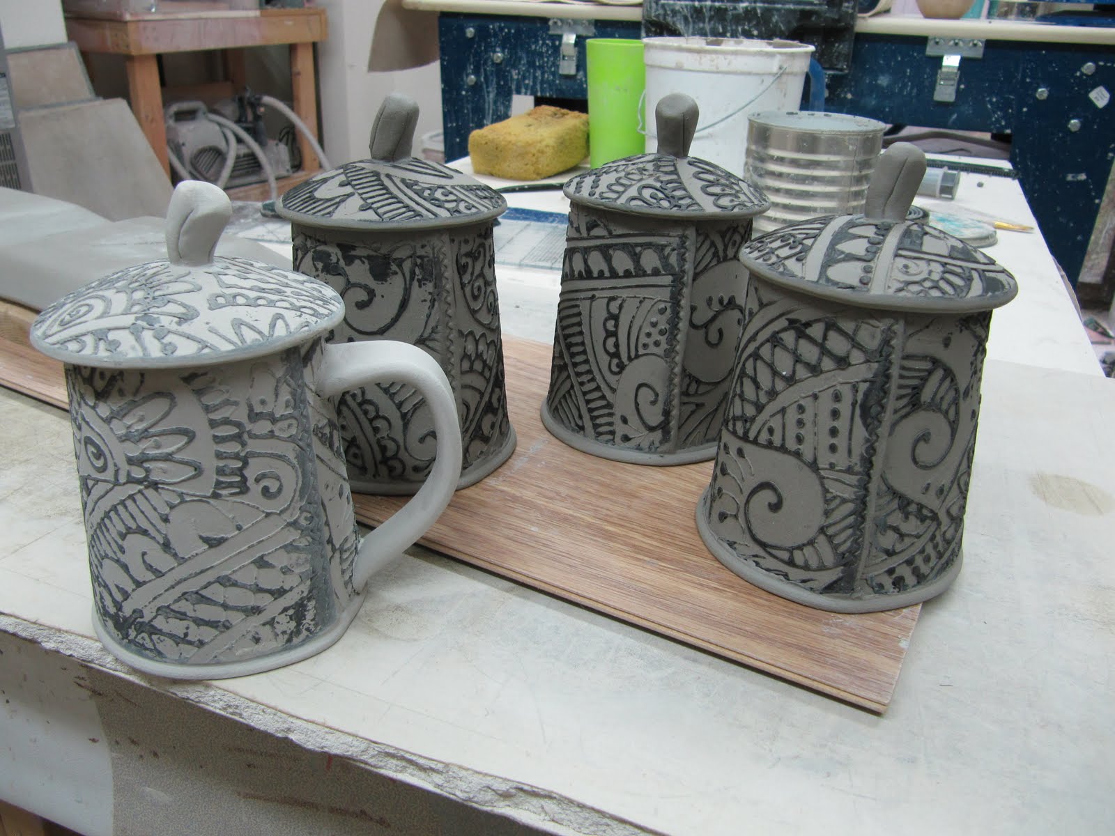 Creative with clay Pottery by Charan Sachar Handbuilt Lidded jars/ mugs