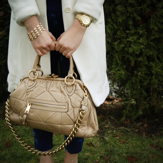 Marc Jacobs Stam handbag, Forever 21 gold bracelet and a gold Michael Kors watch