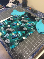 Full DIY toddler shirt spread out on my cutting table. My son's shirt that matches mine! #sewing #kids