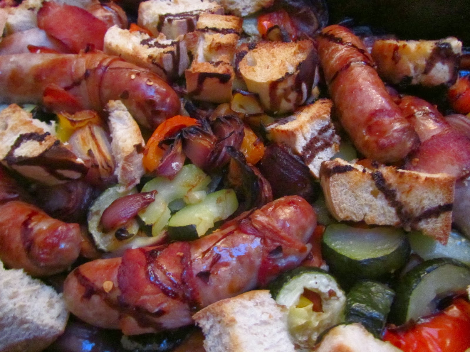 Sticky sausages and balsamic vegetable bake