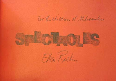 Title page of Spectacles, red background and fuzzy lettering, with artist signature