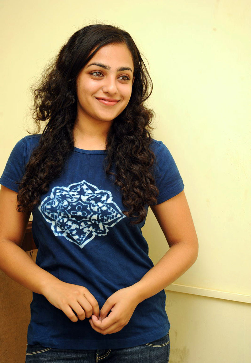 Actress Nithya Menon Latest Photoshoot Images In Green 
