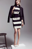 Amanda Seyfried in black and white stripe dress