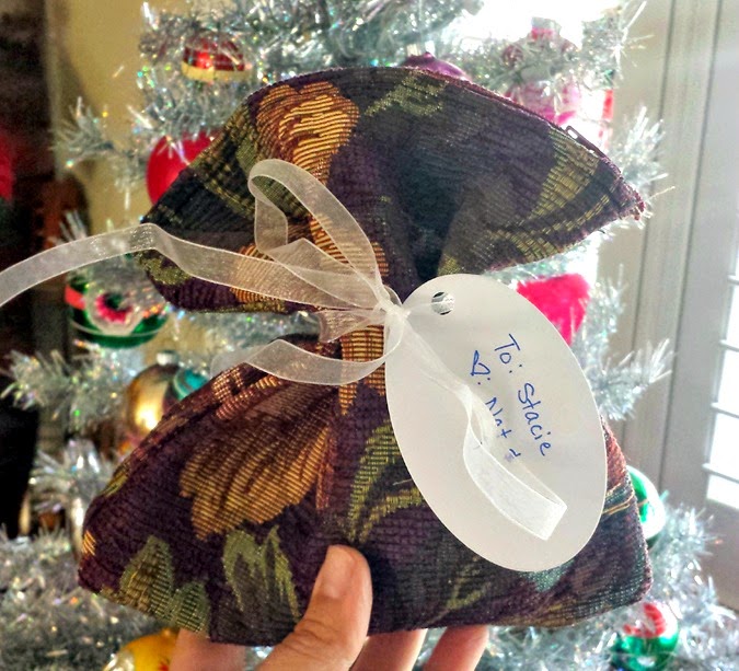 Reusable bag is an easy solution to low waste gift wrapping via The Sunshine Grove Reusable bag is an easy solution to low waste gift wrapping via The Sunshine Grove