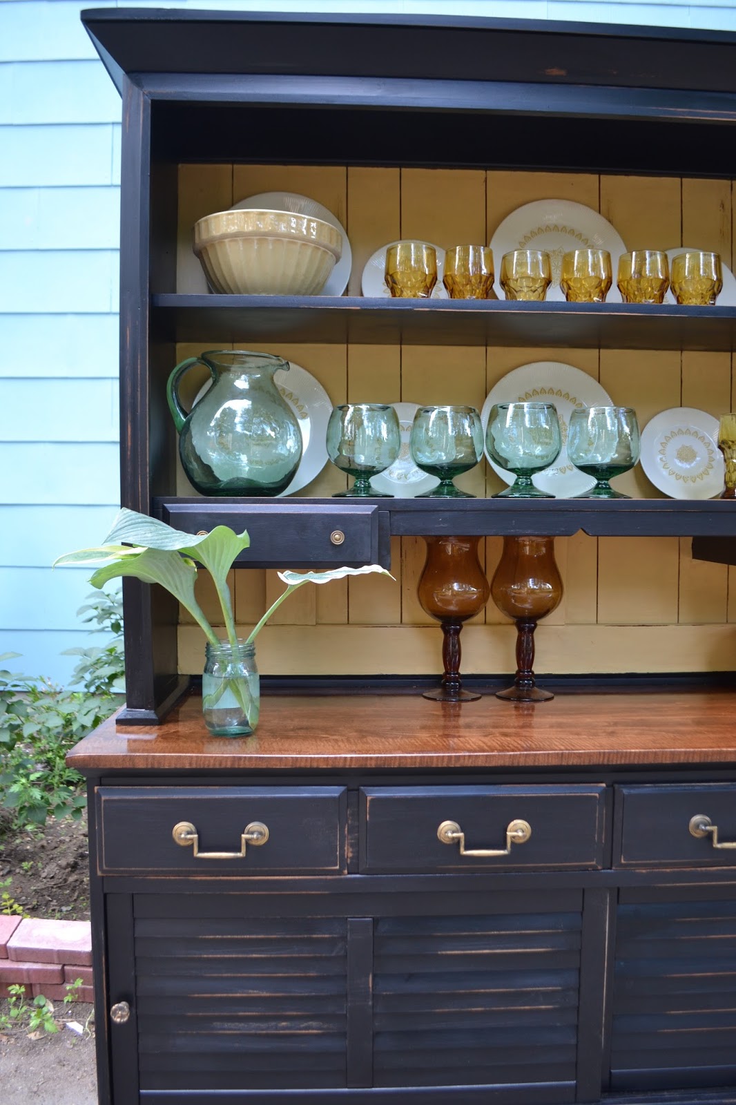 Heir and Space A Vintage Hutch in Black and Pale Yellow