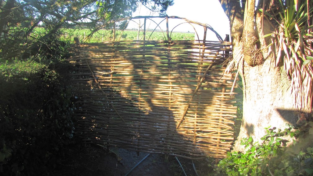 woven gate made out of hazelnut shoots wwoof workway new zealand