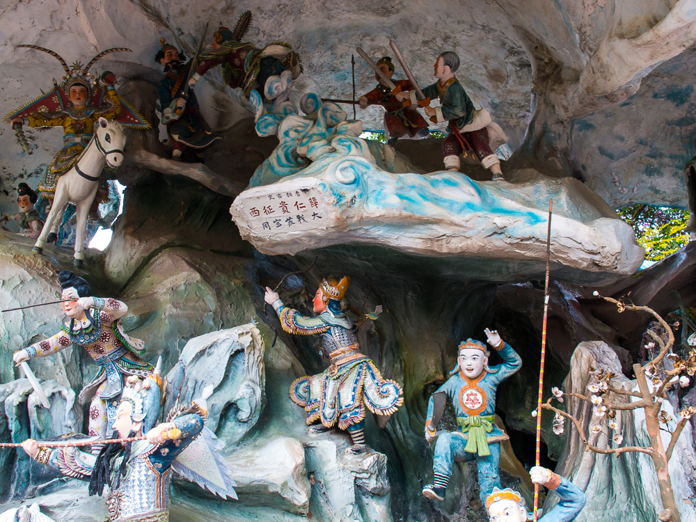 carvings and statues at haw paw villa the 8 deities in haw paw villa theme park in singapore