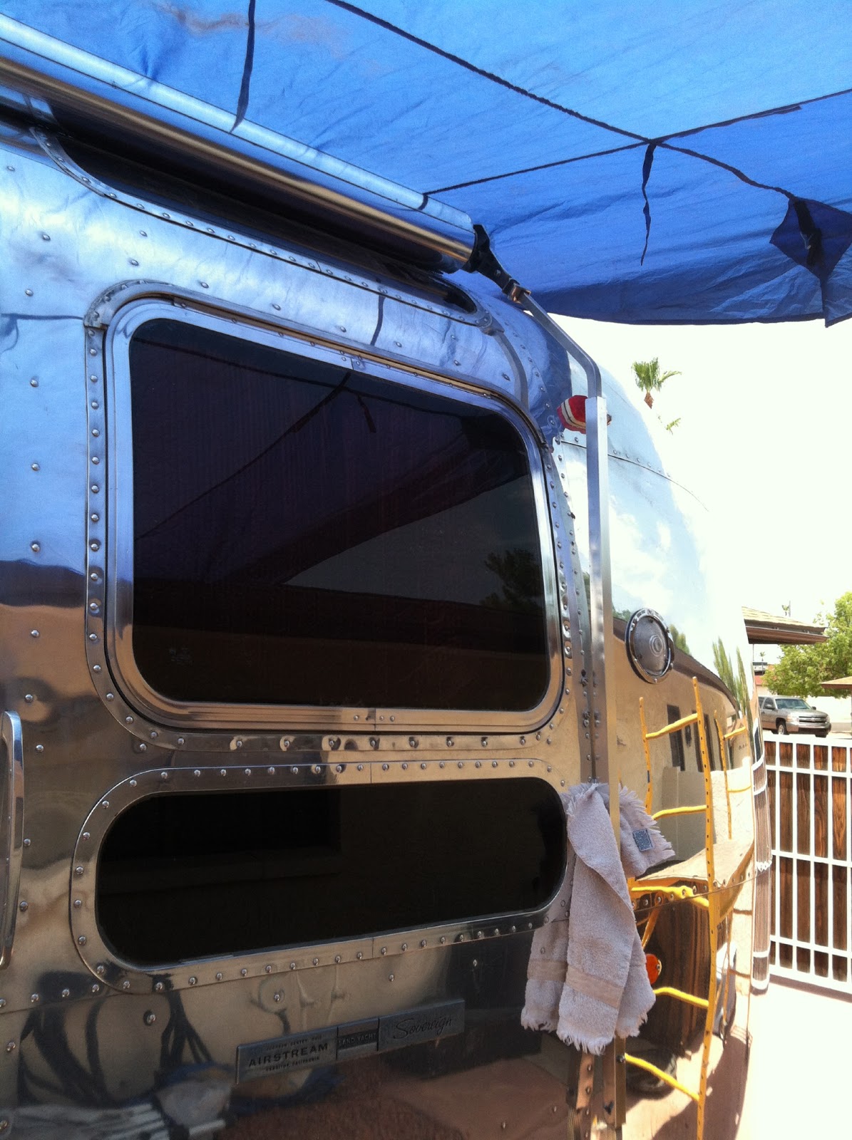 Airstream Renovation Airstream awning Installation with hood vent modification