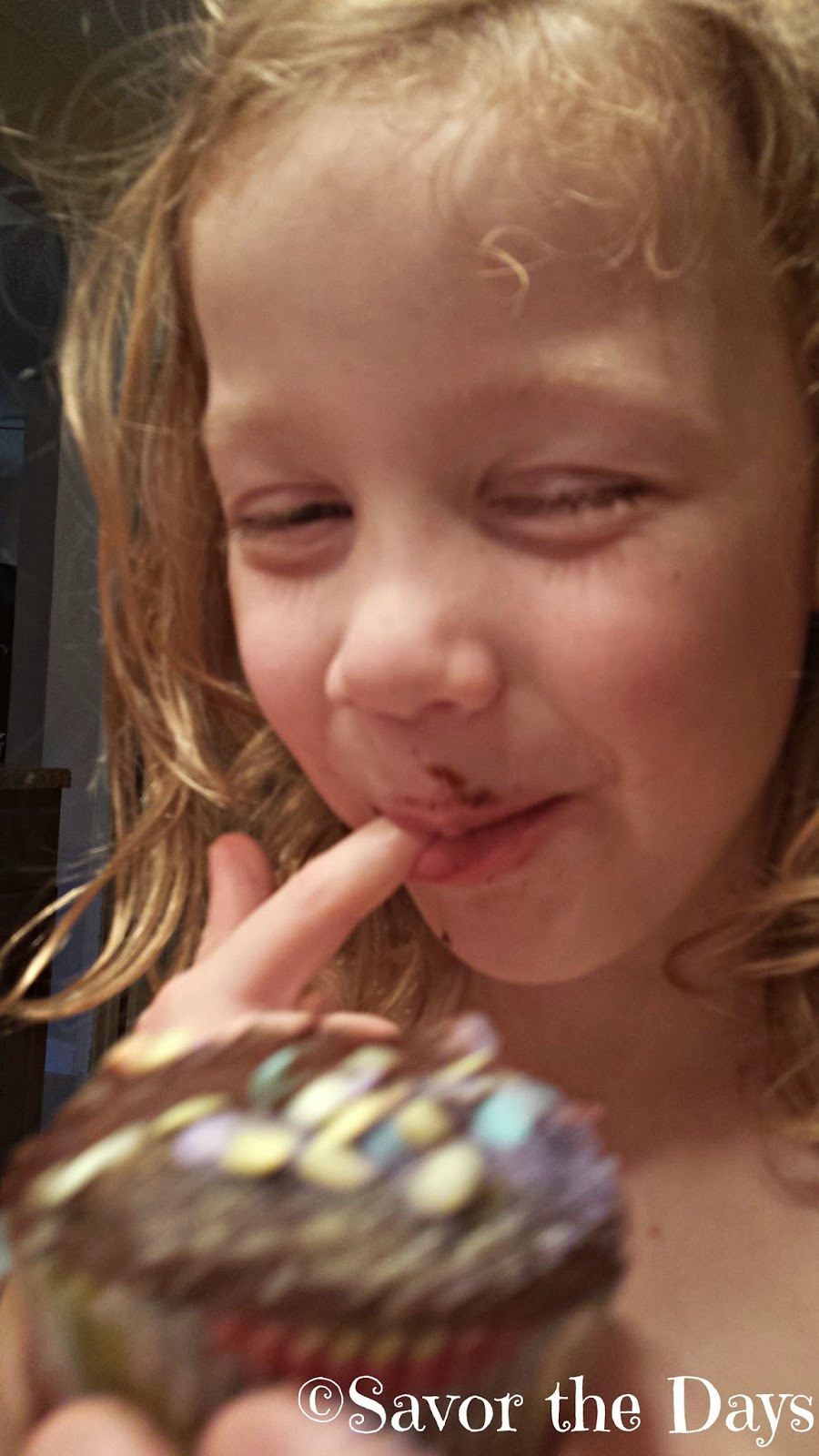 girl eating cupcake