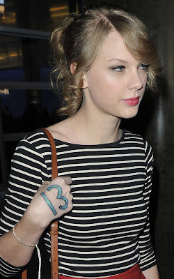 Taylor Swift Haircuts Pictureclass=