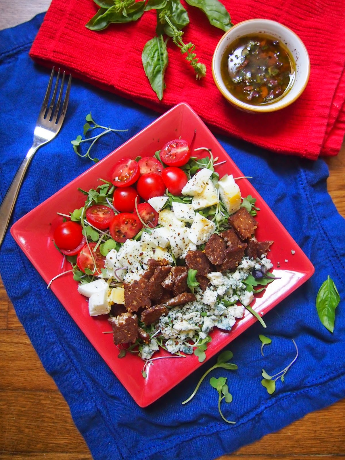 An Avocado A Day Tempeh BLT Salad with Kalamata Vinaigrette
