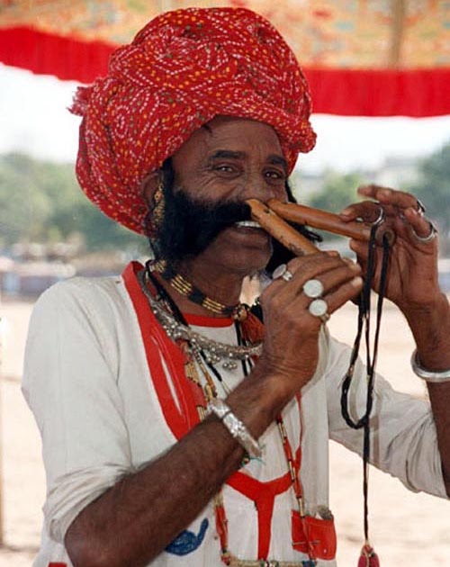 FUN TIME CLUB The Man Playing Flute With Nose