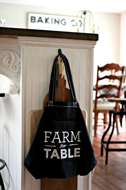 Target farm to table bag on DIY kitchen island with bead board - www.goldenboysandme.com