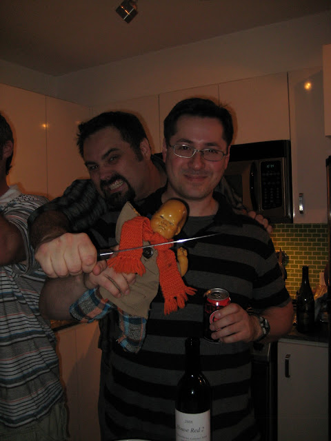 Man pretending to kill baby doll. Man pretending to kill baby doll.