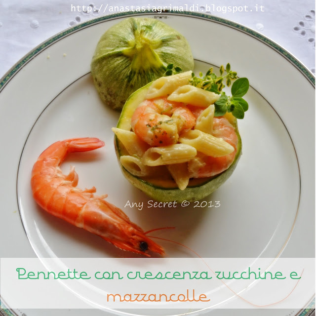pennette con crescenza, zucchine e mazzancolle servite nelle zucchine tonde