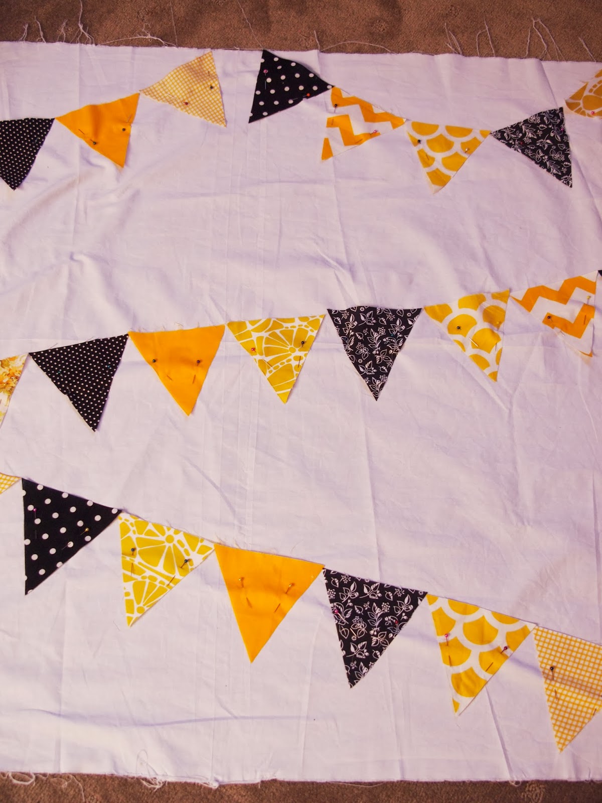 THE THRIFTY CHALLENGE A pennant quilt.