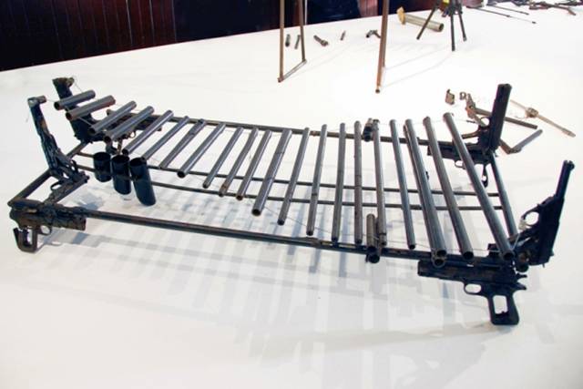 An Orchestra of Musical Instruments made from Weapons by Pedro Reyes