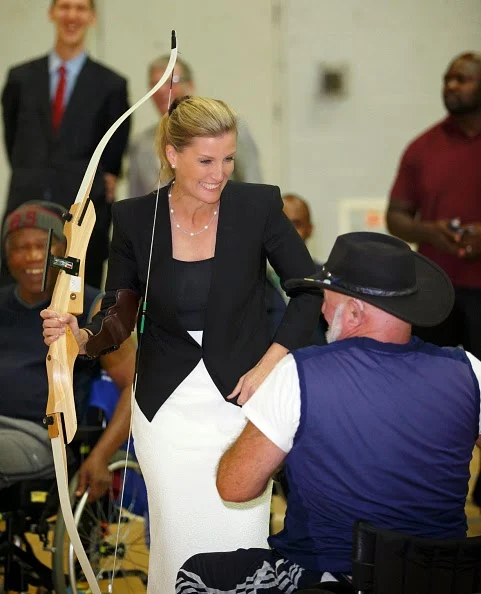 Sophie, Countess of Wessex tries her hand at archery during a visit to WheelPower at the Stoke Mandeville Stadium 