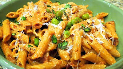 Penne with Vodka Sauce penne pasta, fresh peas, vodka sauce