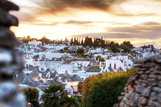 Alberobello a Unique Italian Village Alberobello, the city of drystone dwellings known as trulli , is an exceptional example of vernacular architecture. It is one of the best preserved and most homogeneous urban areas of this type in Europe. Its special features, and the fact that the buildings are still occupied, make it unique. It also represents a remarkable survival of prehistoric building techniques.
