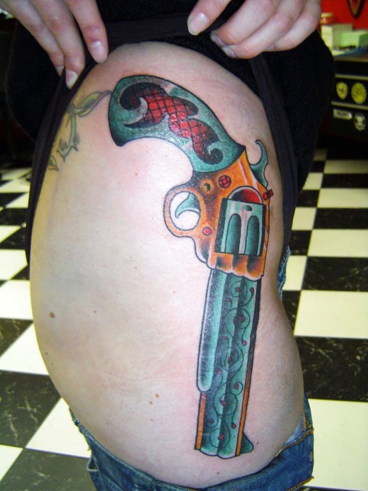 The second of my Gun Tattoos is this another stunning thigh gun tattoo 