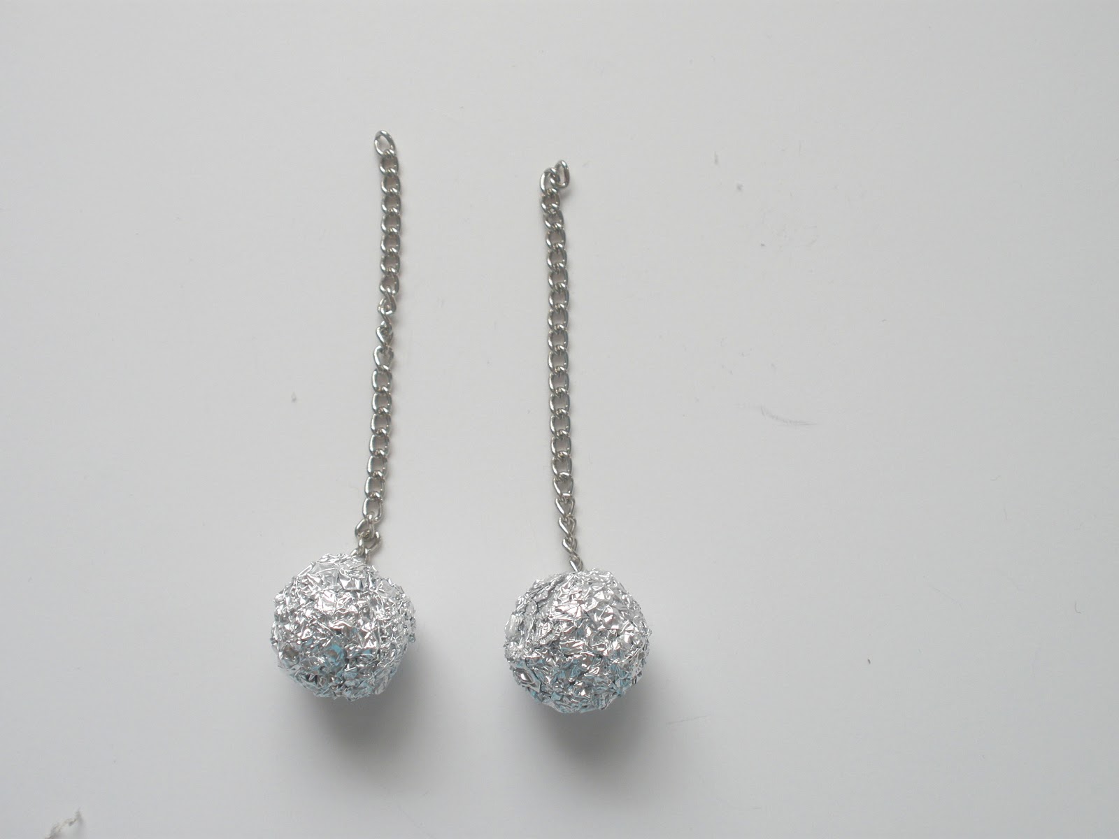 handmade by stacy vaughn tin foil earings