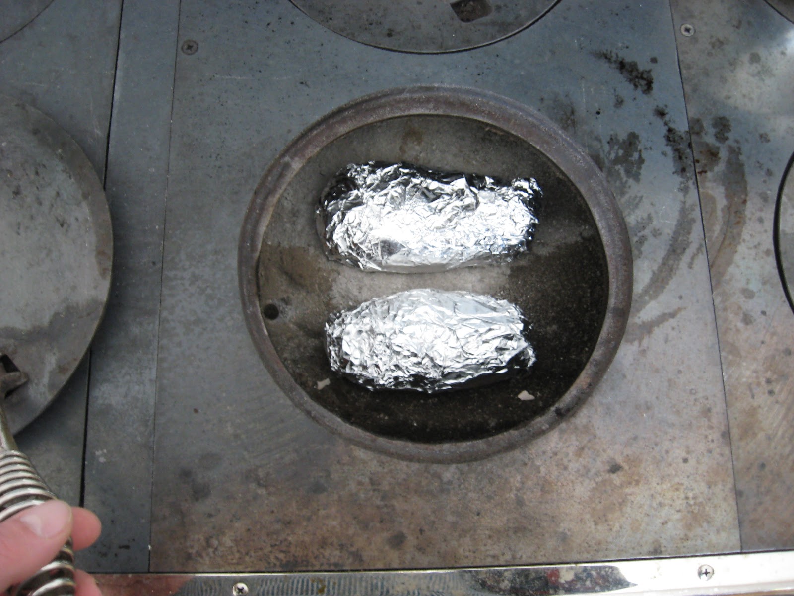 Wood Cookstove Cooking Baking Potatoes in Your Wood Cookstove