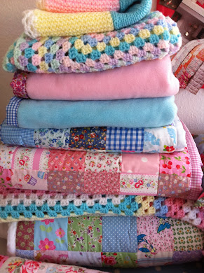 Snuggly quilts and blankets i sell in my shop