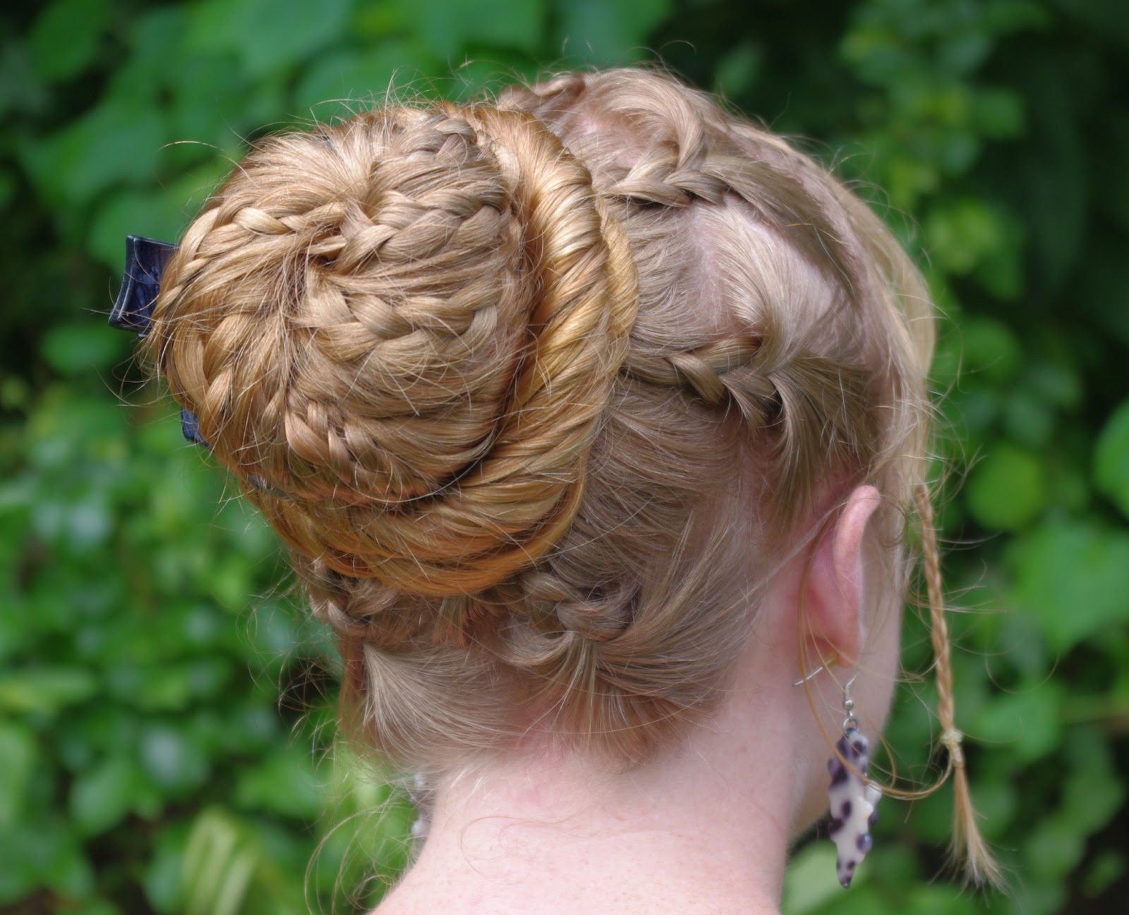 Cinnamon Bun With Accent Braids Hairstyle
