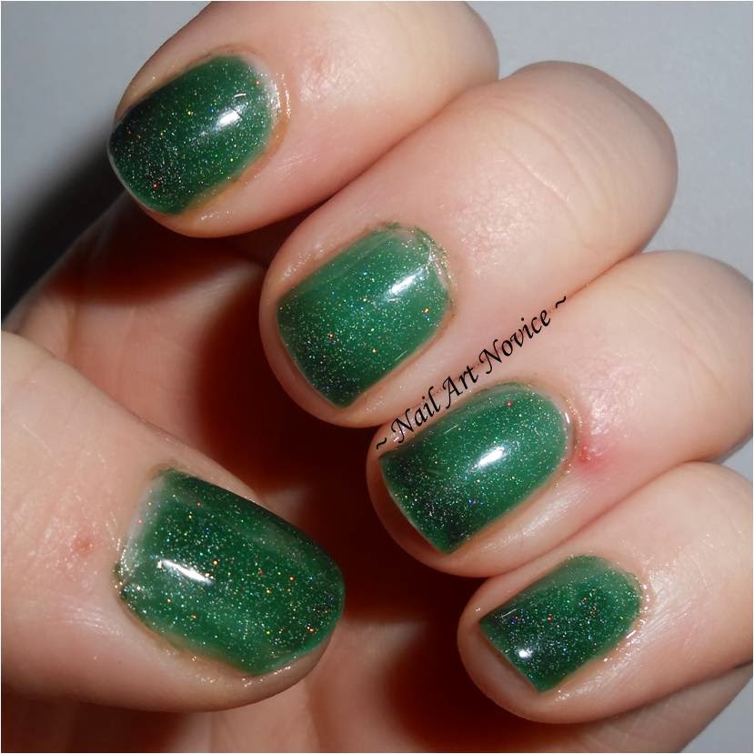 Swatches of Black Cat Lacquer-Evergreen, transitioning state Swatches of Black Cat Lacquer-Evergreen, transitioning state