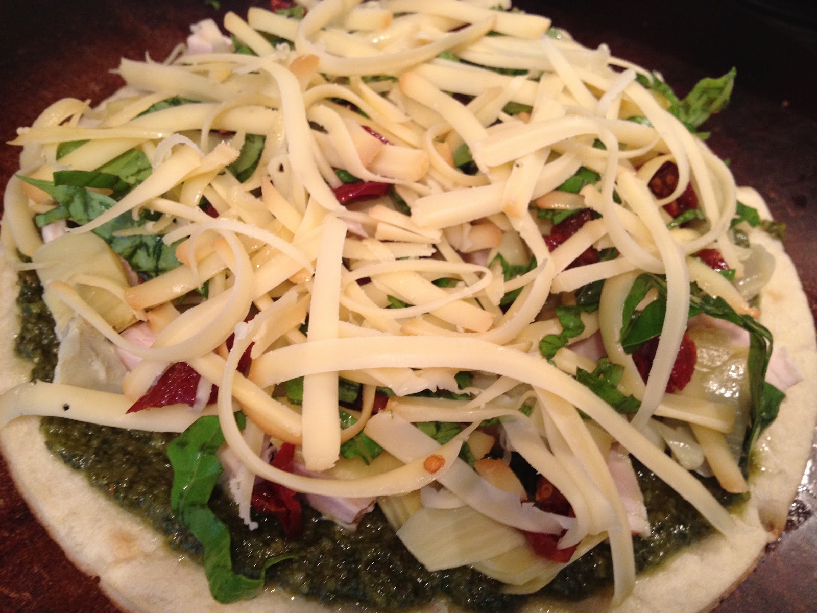 Now I Sit Me Down To Eat Pesto Chicken Artichoke Pizza