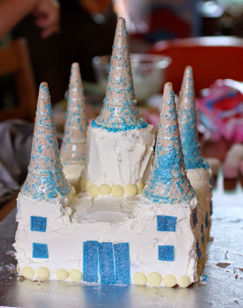 Green Gourmet Giraffe Frozen Castle Birthday Cake step by step